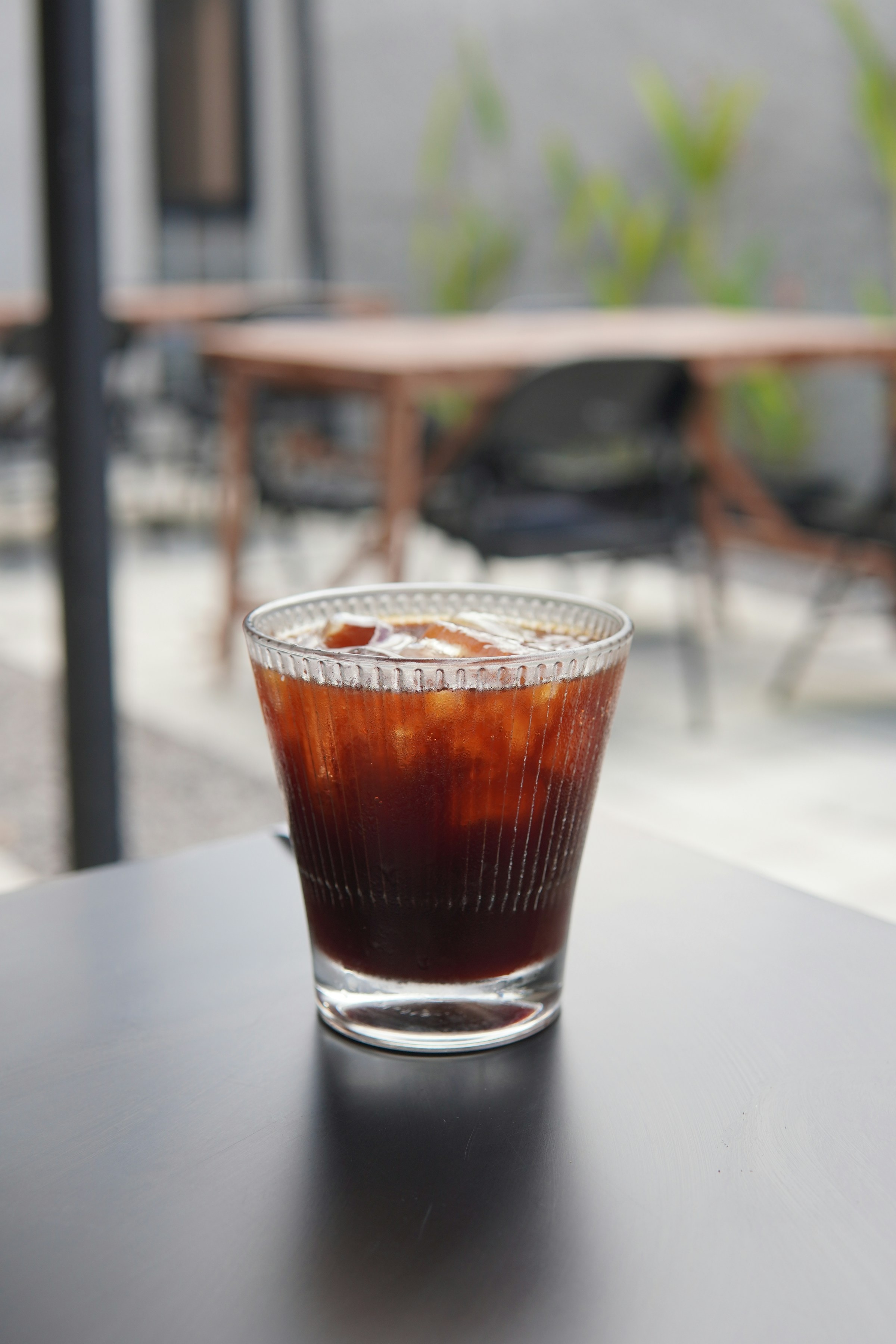 Cold brew coffee served over ice in a glass